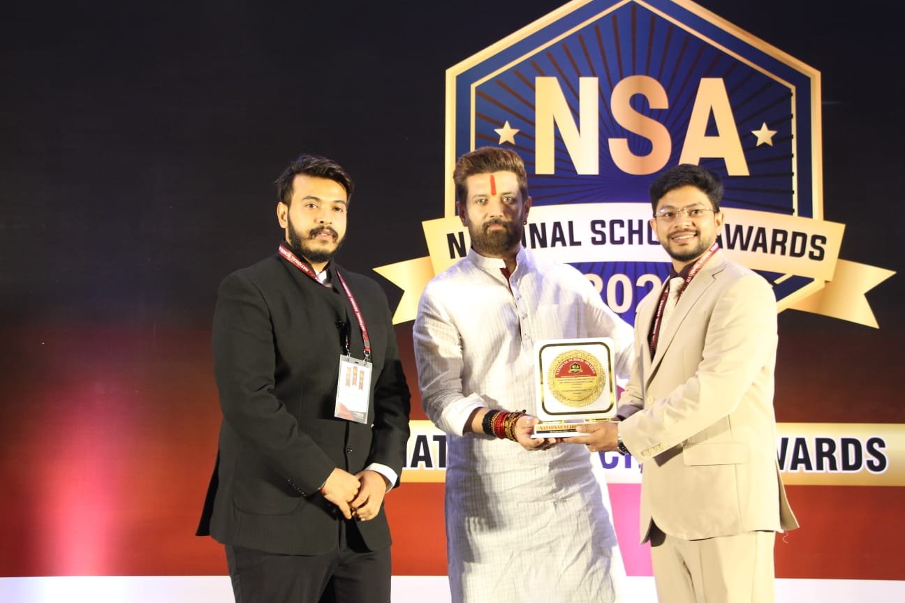 BrovAI representative receiving a National School Awards trophy